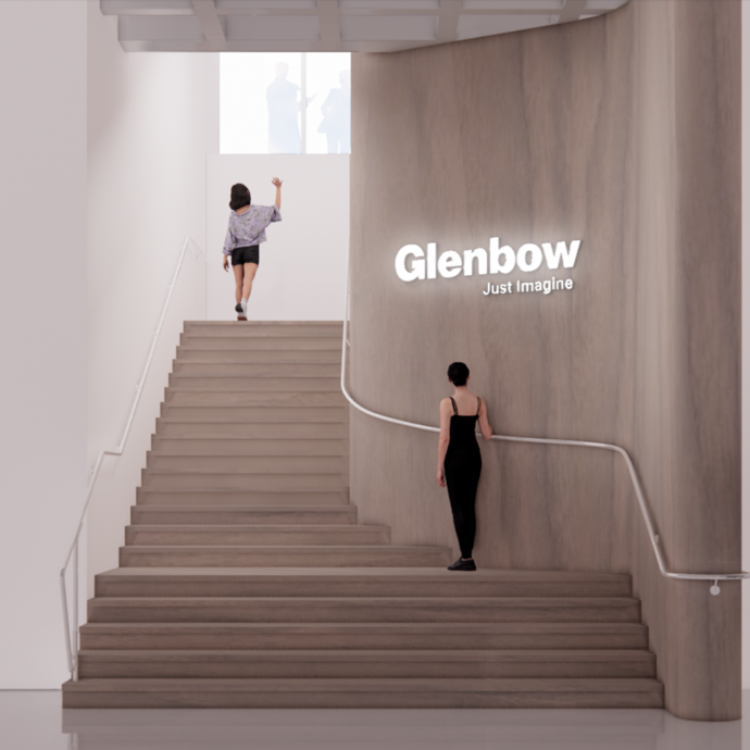 A rendering of a modern interior with two people on a wide staircase. A glowing "Glenbow Just Imagine" sign is on the right wall.